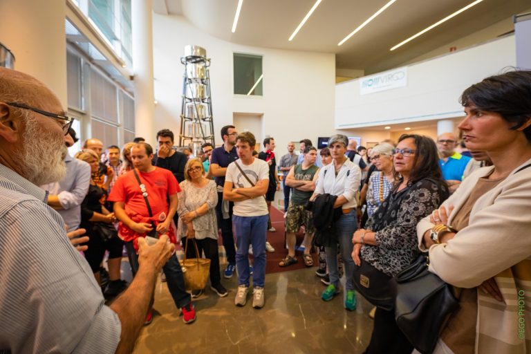 Visitors doing a guided tour at EGO