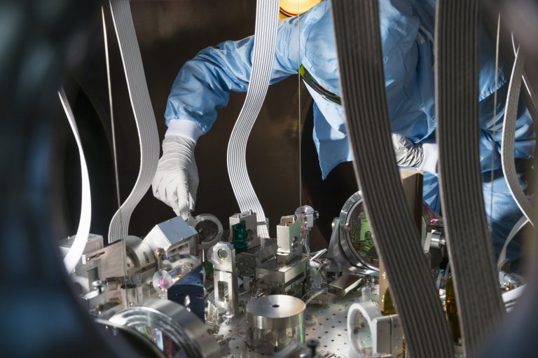CNRS researcher at work on one of Virgo’s optical benches